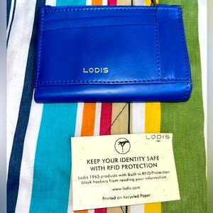 Blue leather LODIS wallet.